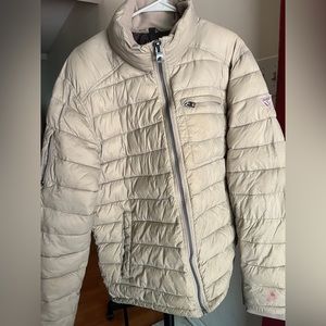Guess Puffer Jacket. Lots of pockets. Stain on sleeve.